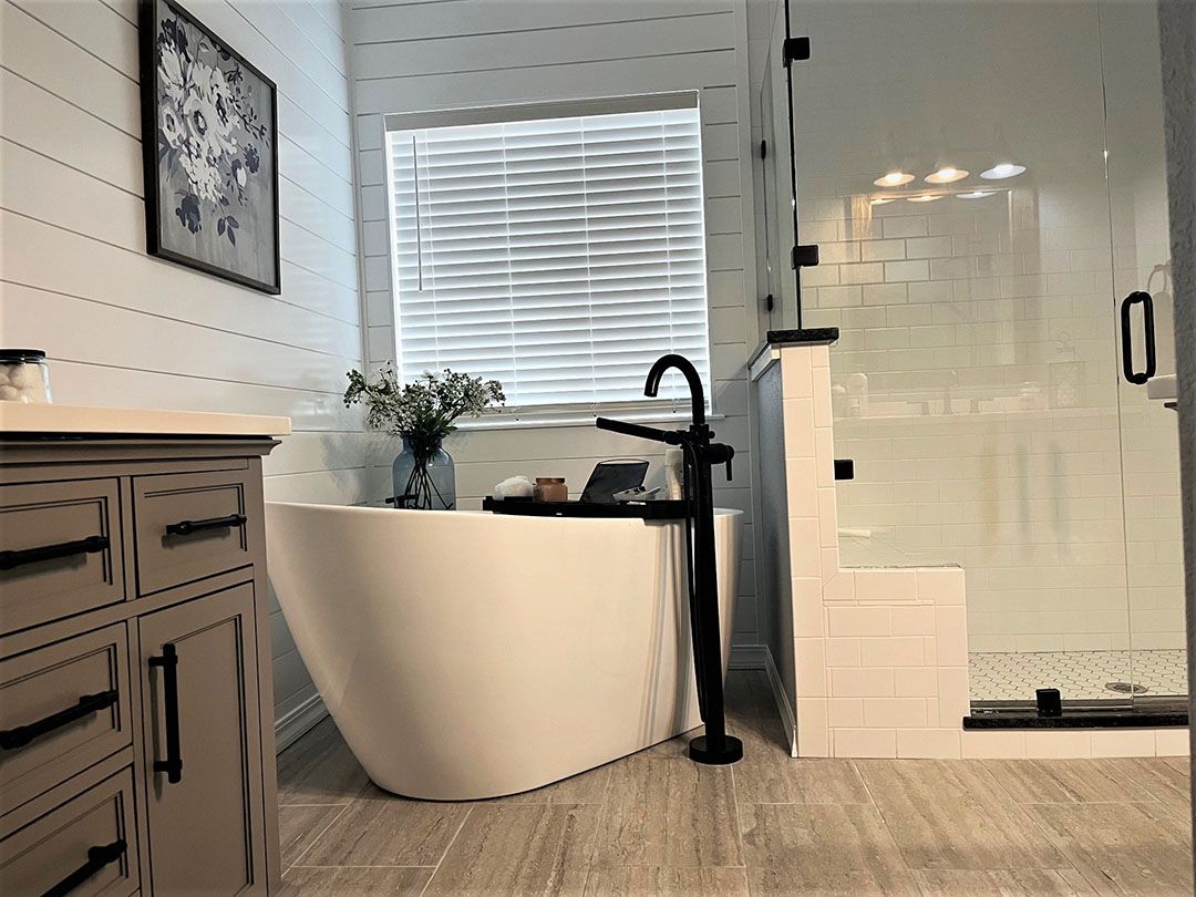 Luxury bathroom remodel with artistic tub.